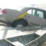 car in lake